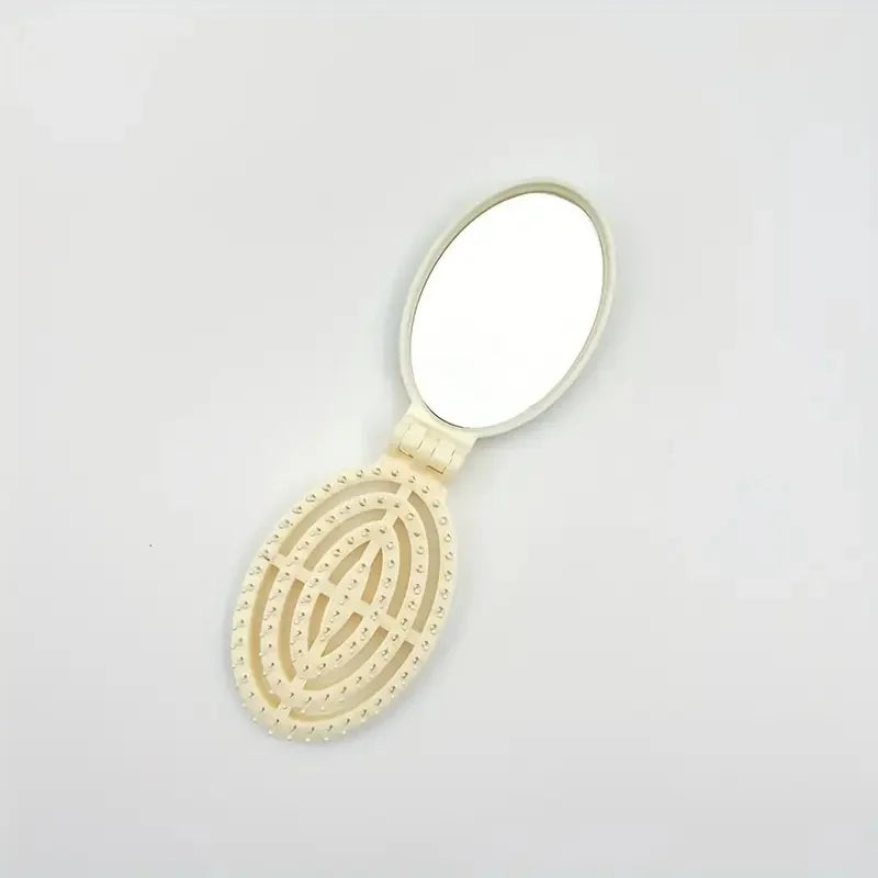 Portable Folding Hair Comb with Mirror, Lightweight & Travel-Friendly for On-the-Go Styling. A Perfect Gift for Women & Girls.
